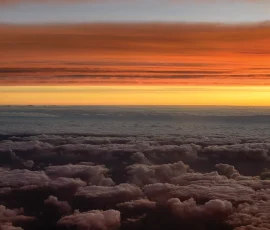 Dawn over the clouds